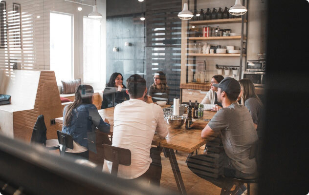 Focused minds at work: Strategy session with consultants discussing the path to success amidst change.